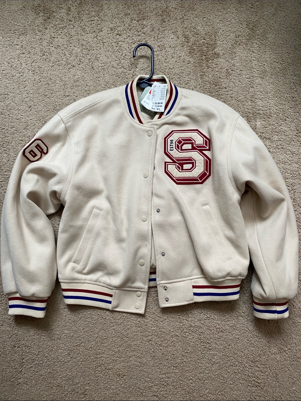Cream Varsity Jacket with Red Lettering